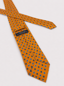 Cravatta uomo 3 pieghe in seta twill arancione fantasia geometrica Made in Italy