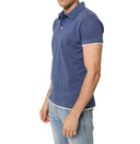 Polo in cotone piquet bordi contrasto in colore blu
