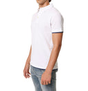Polo in cotone piquet bordi contrasto in colore bianco