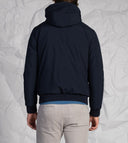 Giubbotto uomo in tessuto tecnico con cappuccio