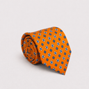 Cravatta uomo 3 pieghe in seta twill arancione fantasia geometrica Made in Italy