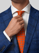 Cravatta uomo in pura seta arancione microfantasia blu 3 pieghe