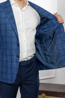 Giacca uomo sartoriale 2 bottoni in misto lana blu a quadri sfoderata