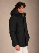 Parka uomo lungo imbottito in tessuto tecnico idrorepellente con cappuccio e doppia chiusura